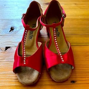 Very Fine brand size 7 wide custom dance shoes. Like new.